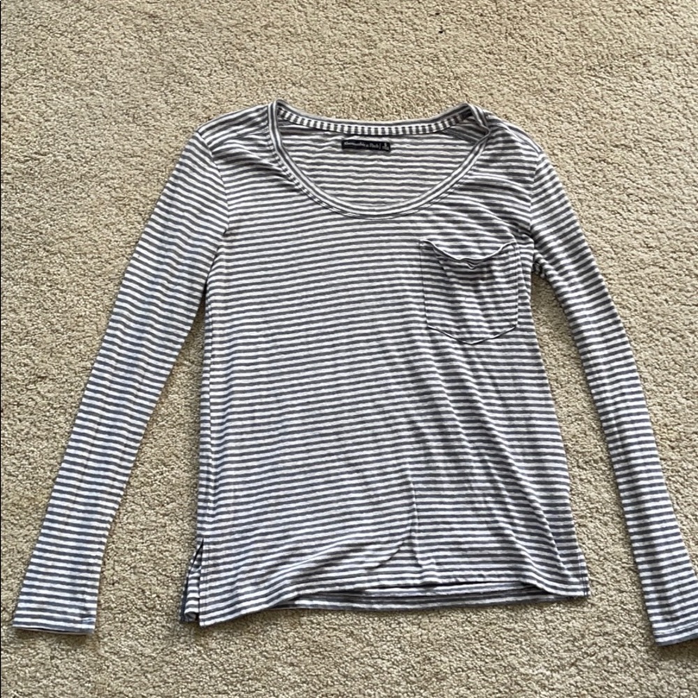 Long sleeve light blue and white shirt